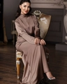 Detail of elegant coffee satin maxi dress showing the high neck and smooth fabric texture - S / Brown