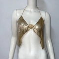 Detail of gold metal mesh sequins and round buckle on a sexy halter neck party top - S / Gold