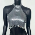 Detail of silver metallic mesh halter top featuring mirror sequin fringe on black mannequin - S / Gunmetal