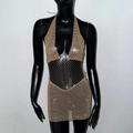 Dettaglio dell'abito all'americana color oro champagne con strass lucidi e ritagli - S / Oro