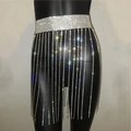 Close-up of sparkling rhinestone tassel body chain belt with long fringe on a mannequin - Sparse Chain Style / Silver