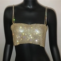 Macro detail of sparkling gold rhinestone mesh and metallic straps on the party crop top - S / Gold