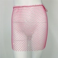 Dettaglio della gonna a rete rosa con strass scintillanti sul tessuto a maglia fine - Taglia unica / Strass Rosa Fucsia / Rosa Rosso