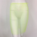 Gros plan détaillé de la jupe en maille vert fluo ornée de strass argentés scintillants - Vert Néon (Jupe 55cm)