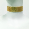 Detail of gold metal sequin choker necklace featuring wide mesh chain design and reflective discs - 2.5cm Choker / Gold