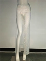 Detail of white mesh skirt featuring sparkling rhinestones and a high side slit design - One Size / White Rhinestone Skirt