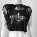 Detail of black sequin metal mesh fabric texture on women's cropped punk vest top - Black Long Style