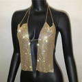 Detail of gold rhinestone mesh halter top featuring metal chains and shimmering finish - Gold