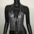 Macro view of silver rhinestone halter top showing sparkling metallic sequin details - Black