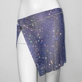 Close-up of asymmetrical blue rhinestone mesh skirt with side slit and chain detail - Royal Blue