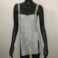 Vista macro dei dettagli dei brillantini argento su un vestito da festa metallizzato - S / Argento