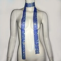 Detail of dark blue rhinestone mesh scarf showing shimmering crystals on metal grid - Sapphire Blue