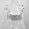 Close-up of shimmering silver sequin metallic mesh halter top for music festivals - Silver