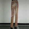 Dettaglio dei pantaloni in rete color champagne con strass scintillanti per le feste - Pantaloni Champagne