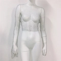 Dettaglio del top corto a rete argento con strass scintillanti su trama fine - Taglia unica / Argento