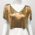 Macro shot of gold metallic mesh fabric with v-neck detail on festive sequin crop top - S / Gold