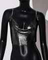 Detailed view of black metal sequin halter top with fine mesh texture on a mannequin - One Size / Black