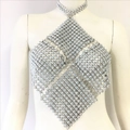Close-up of shiny silver rhinestone mesh halter top with metallic ring connectors - S / Silver