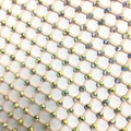 Detail van sprankelende AB-strass op huidkleurige elastische meshstof voor feestjurken - S / Huidskleur