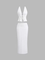 Detailed view of white two-piece set featuring halter neck top and ruched maxi skirt - S / White