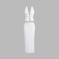 Detailed close-up of white two-piece set featuring halter neck top and ruched high waist skirt - S / White