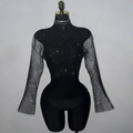 Close-up of black mesh top with sparkling rhinestones and elegant bell sleeves - One Size / Black