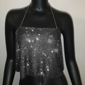 Close-up of sparkling rhinestone halter top with adjustable metal chains on mannequin - One Size / Black