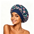 Détail du bonnet de nuit en satin avec motif floral et large bande élastique bleu foncé - Bleu marine