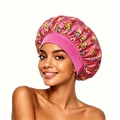 Detail of floral satin bonnet with wide elastic band worn by model on white background - Rose Red