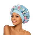 Detail of light blue floral satin sleep bonnet featuring pink peony print and wide elastic band - One Size / Sky Blue