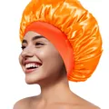 Detail des hochelastischen breiten Bandes an der satinierten Schlafhaube in Orange - Orange