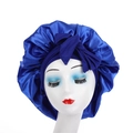 Detail of royal blue satin sleep bonnet with wide headband and large decorative bow - Sapphire Blue