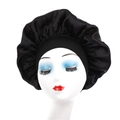 Black satin sleep cap with wide elastic band on model for hair protection and beauty care - Black