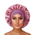 Satin sleep cap for hair protection in pink purple featuring a wide elastic headband - Dark Mauve