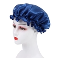 Navy blue satin sleep bonnet for hair care with ruffled edge on white mannequin head - One Size / Sapphire Blue