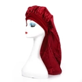 Detail of burgundy satin sleep bonnet with wide ribbons on a white mannequin head - Burgundy
