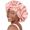 Elastic pink satin hair bonnet with oversized bow design for curly hair protection - Champagne