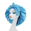 Blue satin sleep bonnet with large bow tie on a white mannequin head for hair care - Bow Knot Style / Lake Blue
