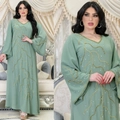 Detail of sage green maxi dress with gold sequin branch embroidery and crystal accents - S / Light Green