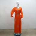 Detailed view of glittering silver rhinestones on a luxury orange chiffon kaftan dress - S / Orange
