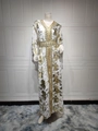 Detail of V-neck white kaftan dress with gold foil print and geometric embroidery - White Gold