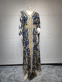 Detail of blue chiffon kaftan with gold foil texture and geometric embroidery - Blue