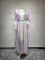 Detail of purple satin abaya dress with silver sequin embellishments and waist belt - Purple