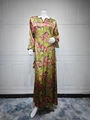 Detail of green floral maxi dress featuring pink blossom patterns and soft silky fabric - S / Light Green