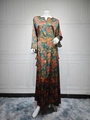 Detail of the V-neckline with shiny bead trim on the orange floral long sleeve dress - S / Dark Green