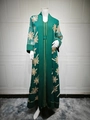 Detail of dark green abaya with intricate golden palm leaf embroidery and gold piping - Green