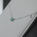 Silver square emerald pendant necklace with green gemstone and clear accent stones - White Gold