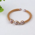 Detail of hand-woven gold-filled cuff bracelet featuring five pink freshwater pearls - Lotus Pink Pearls Dense Gold Wire Mesh Open (NO.19)