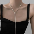 Adjustable silver titanium snake chain necklace with a Y-shaped drop on female model - Titanium Silver 60cm