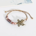 Ethno-Handgemachtes Flechtarmband mit Bronze-Schmetterling und roten Keramikperlen - Drunken Concubine Purpurrot